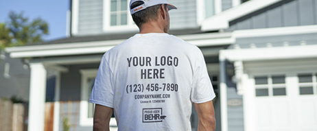 A painter with facing a house