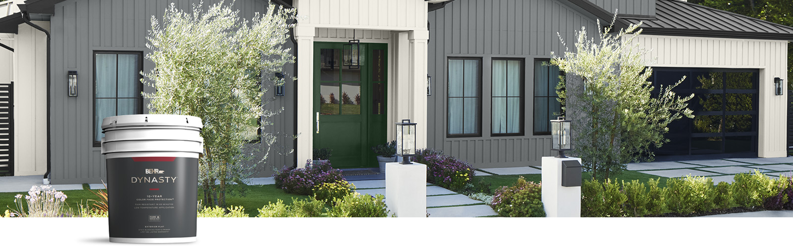 Exterior home featuring a Dynasty Exterior Satin paint can
