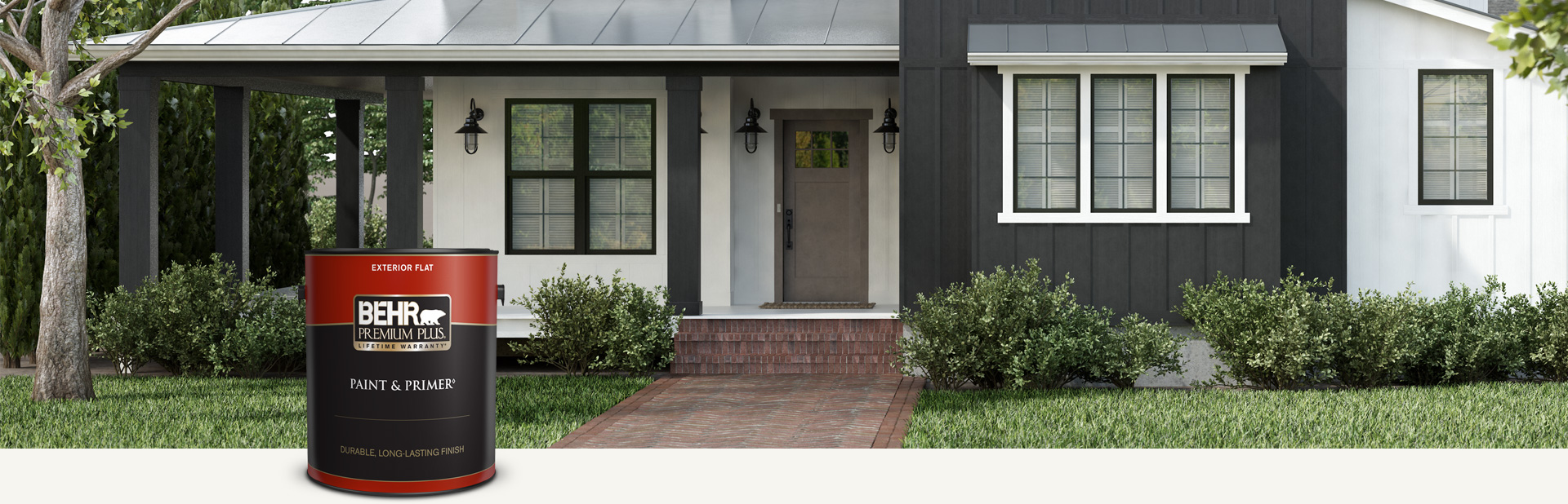 Black and white house exterior with a can of Behr Premium Plus Exterior Flat in foreground