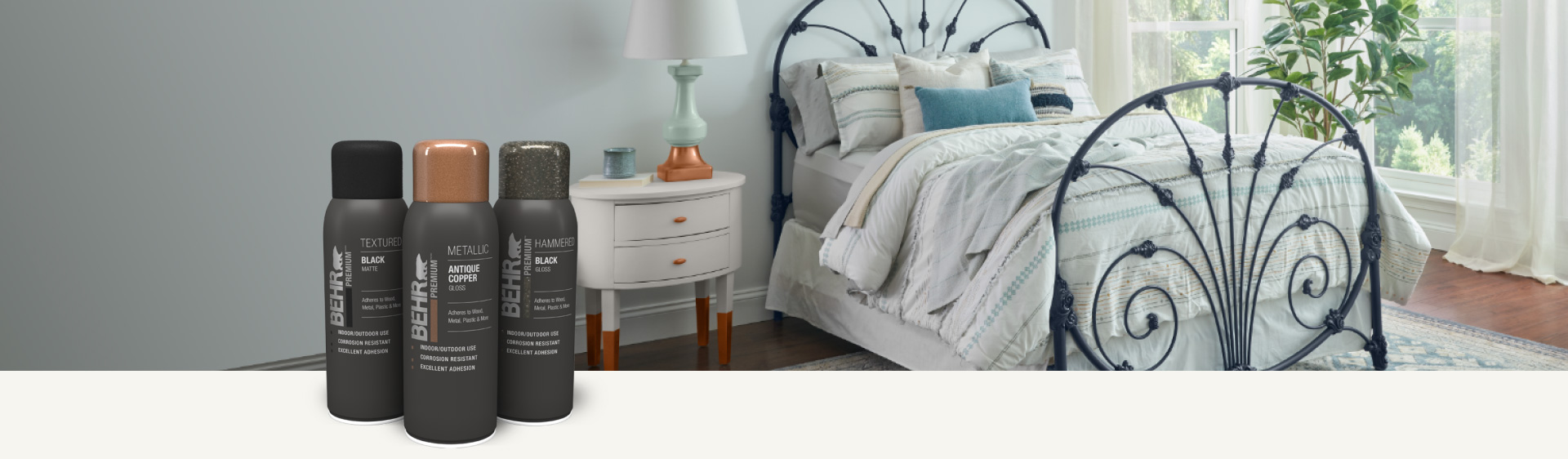 Bedroom with spray painted bed frame, lamp, and night stand